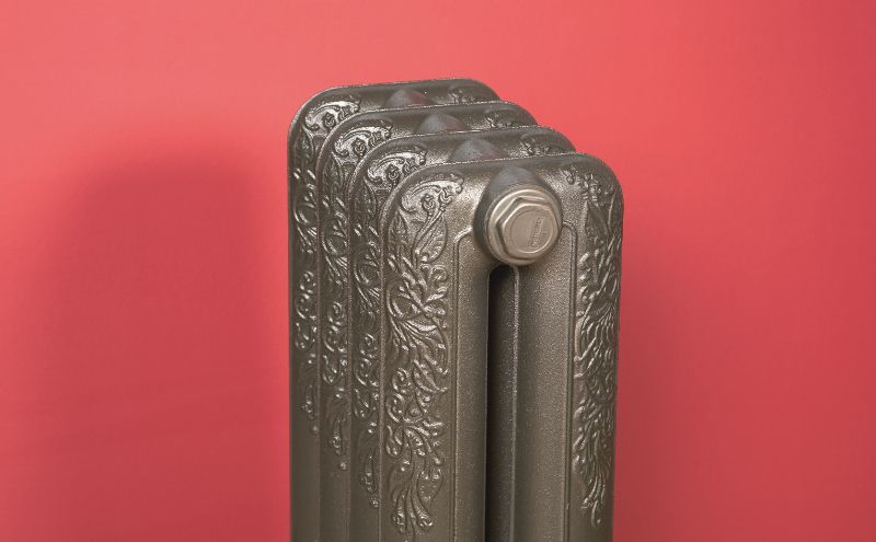Detail on the Burlington cast iron radiator in dark olive brown